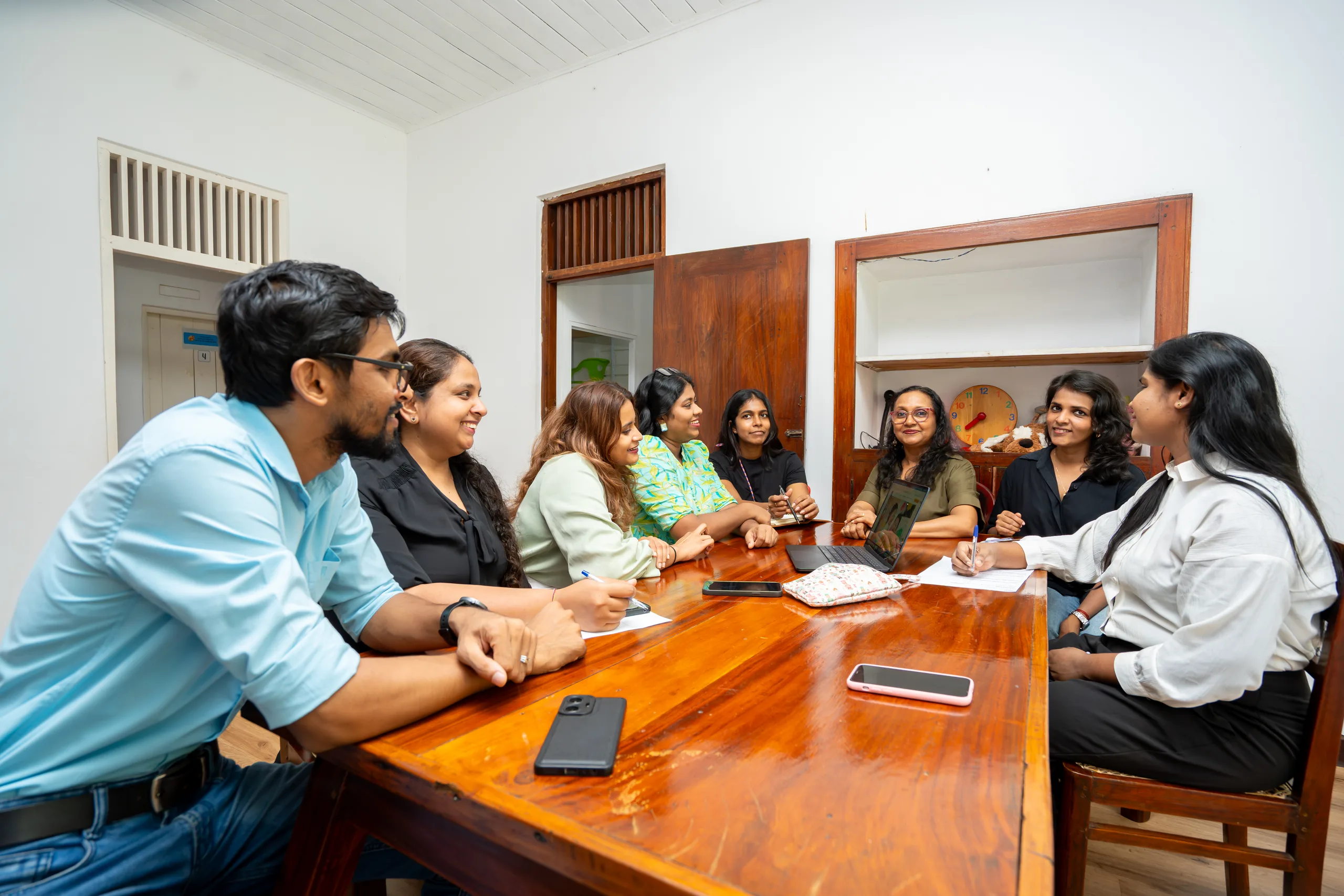 The multidisciplinary team meeting around one table